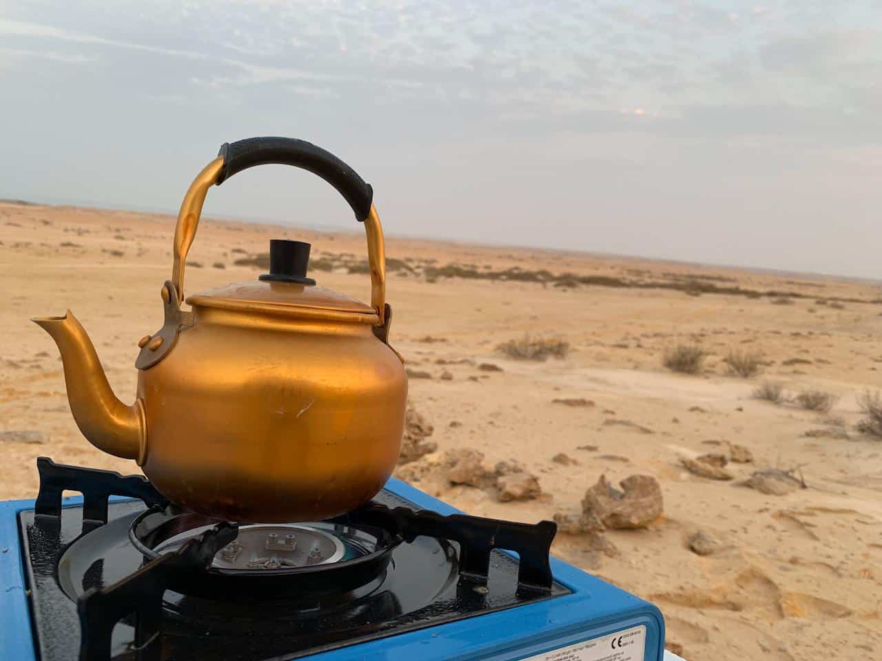 Camping kettle on gas cooker