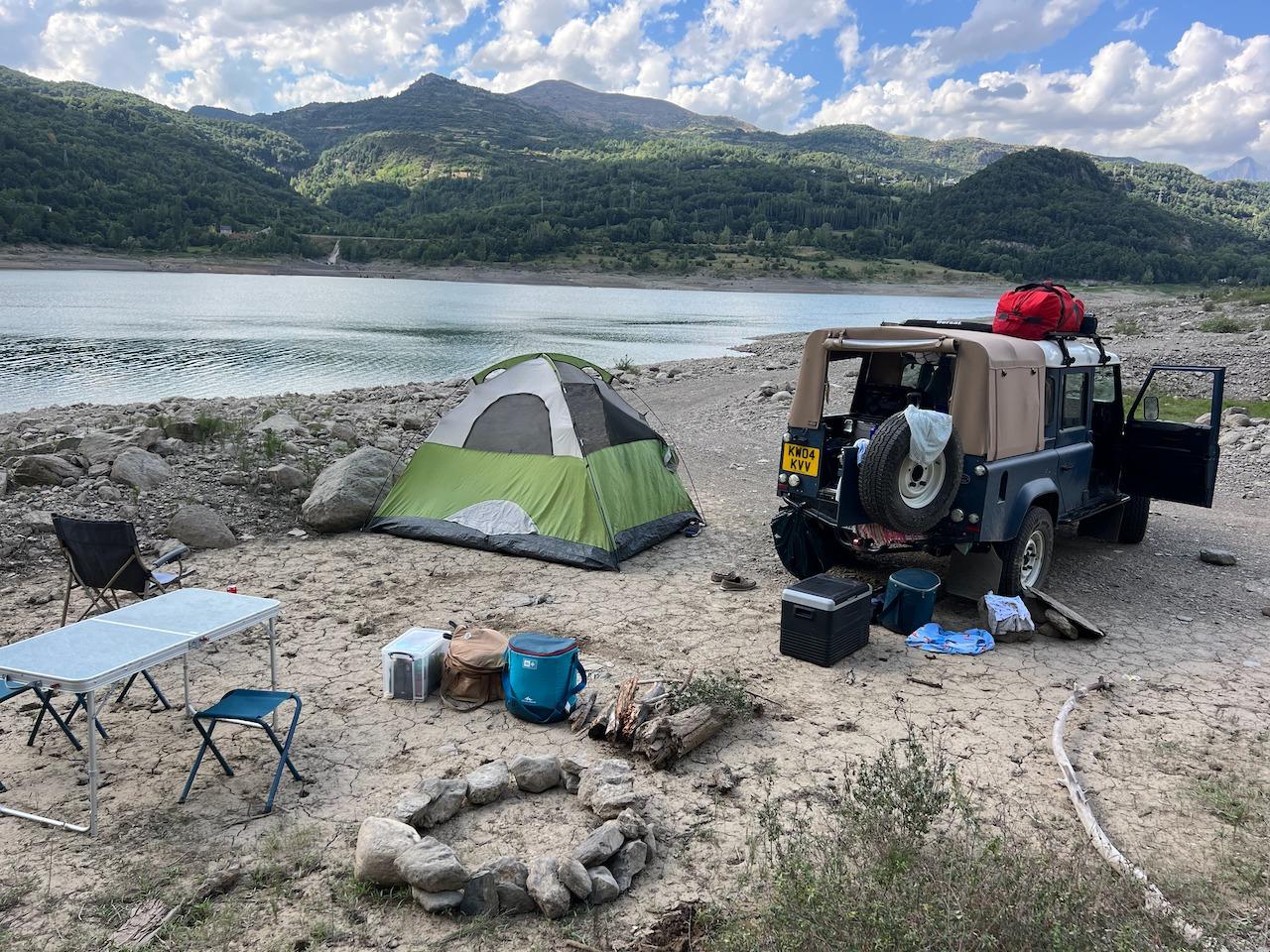 Wild camping near a reservoir in the Pyrenees